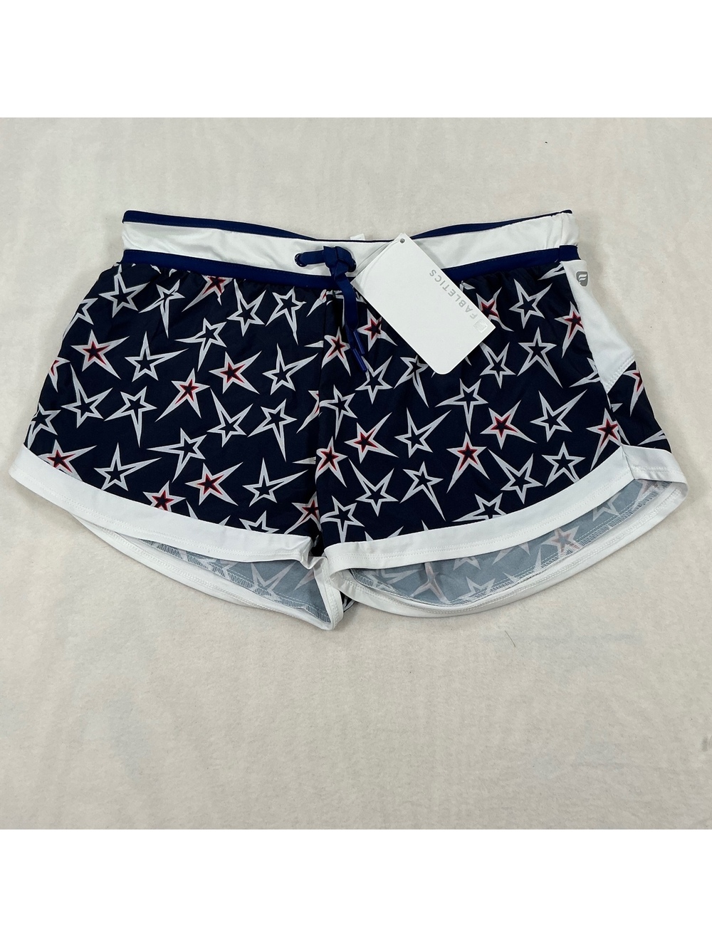 Fabletics Riho Star Print Sport Shorts with Adjustable Waistband and Zippered Pk